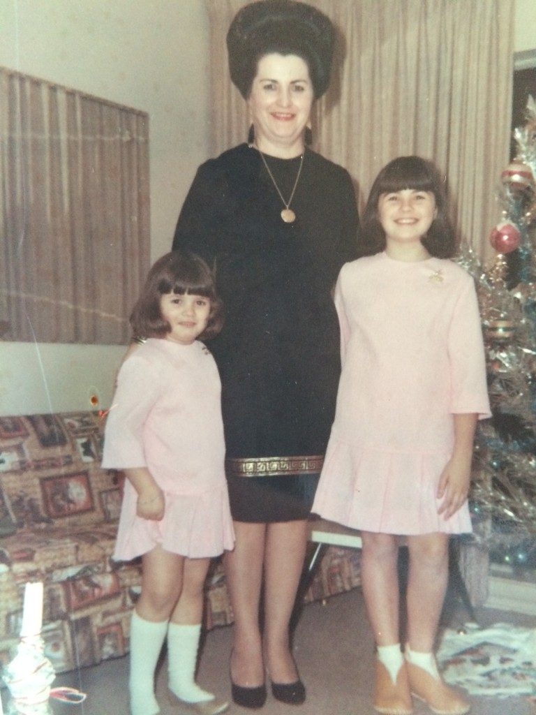 Mama Resi, Lydia (hiking up the dress) and Helga on Christmas eve 1966 in Dallas, Texas.  Mama's beehive game is strong.